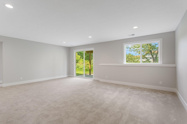 1519 Eagle Shore Ct, Hudsonville, MI 49426 - spare room featuring light colored carpet and recessed lighting