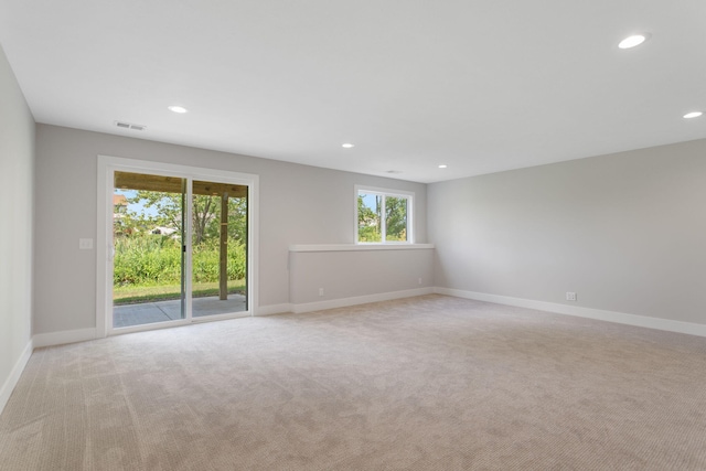 1519 Eagle Shore Ct, Hudsonville, MI 49426 - spare room featuring light colored carpet and recessed lighting