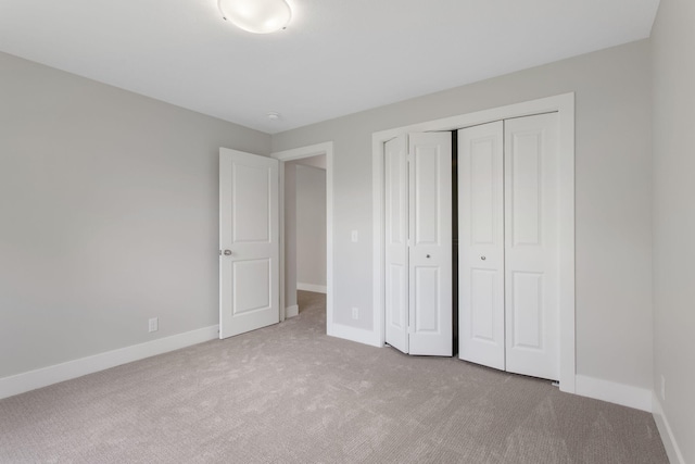 1519 Eagle Shore Ct, Hudsonville, MI 49426 - unfurnished bedroom featuring carpet floors and a closet