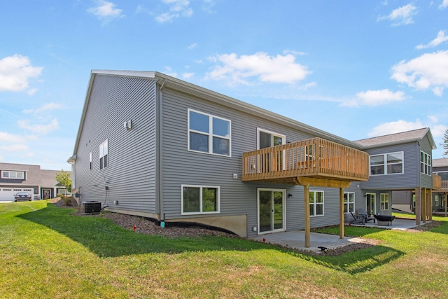 1519 Eagle Shore Ct, Hudsonville, MI 49426 - back of house featuring a lawn, a patio, and a deck