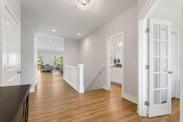 1519 Eagle Shore Ct, Hudsonville, MI 49426 - hallway featuring an upstairs landing, light wood-style flooring, and recessed lighting
