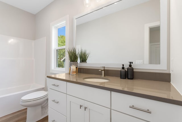 1519 Eagle Shore Ct, Hudsonville, MI 49426 - bathroom with vanity, wood finished floors, and washtub / shower combination