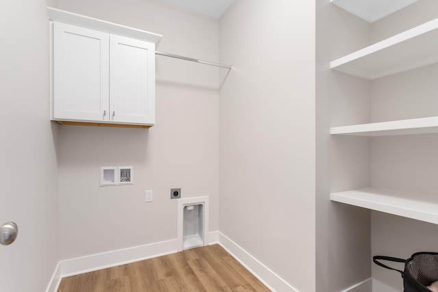 1519 Eagle Shore Ct, Hudsonville, MI 49426 - laundry room with hookup for a washing machine, light wood-style flooring, hookup for an electric dryer, and cabinet space