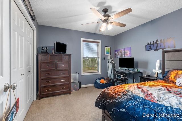5845 Nile Dr SW, Wyoming, MI 49418 - bedroom with light carpet, a closet, and ceiling fan