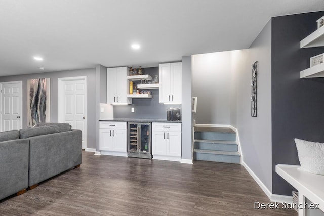 5845 Nile Dr SW, Wyoming, MI 49418 - indoor bar with beverage cooler, dark wood-type flooring, and recessed lighting