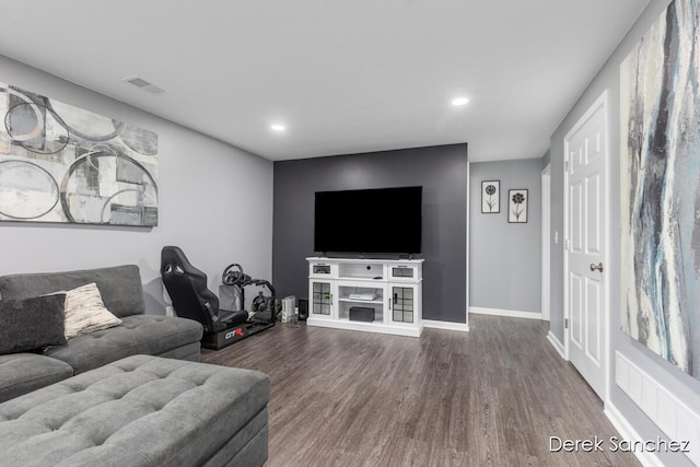 5845 Nile Dr SW, Wyoming, MI 49418 - living room featuring wood finished floors and recessed lighting
