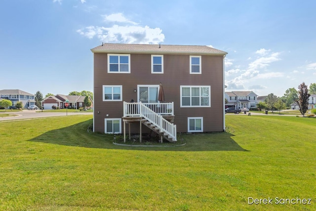 5845 Nile Dr SW, Wyoming, MI 49418 - back of house featuring a lawn and stairway