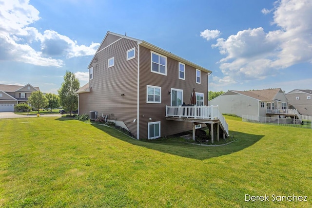 5845 Nile Dr SW, Wyoming, MI 49418 - rear view of property featuring a deck, stairs, and a residential view