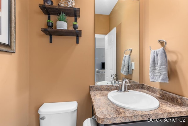 5845 Nile Dr SW, Wyoming, MI 49418 - bathroom with toilet and vanity