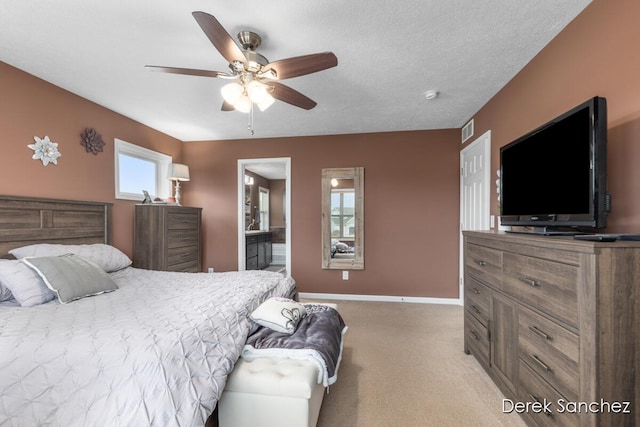5845 Nile Dr SW, Wyoming, MI 49418 - bedroom with light carpet, a ceiling fan, and ensuite bathroom