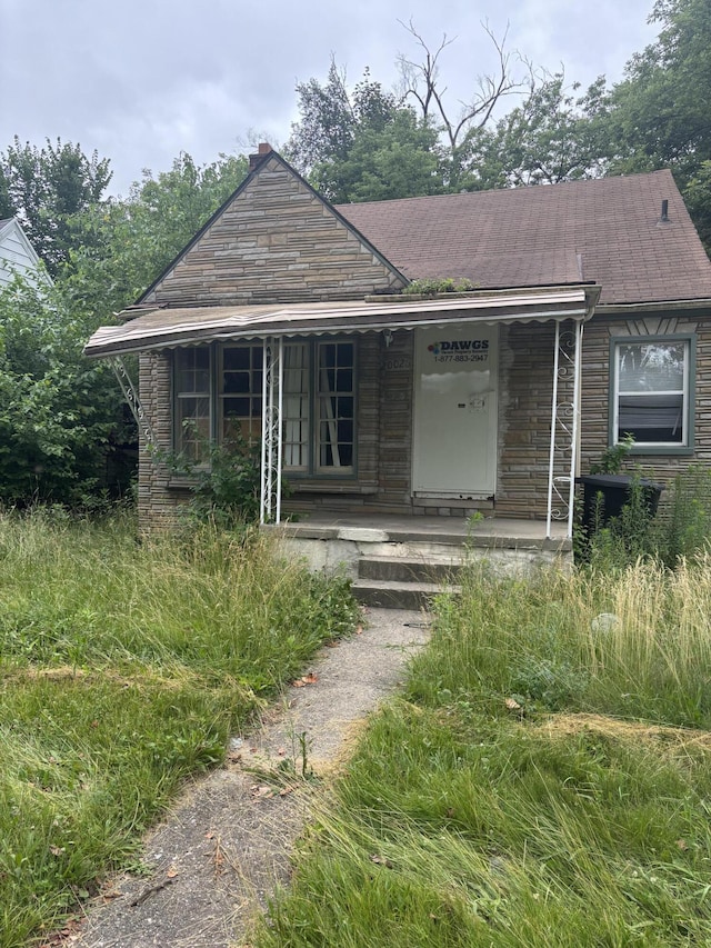 20026 Avon Ave, Detroit, MI 48219 - view of front of house featuring covered porch