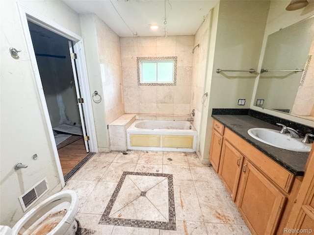 7889 Chilson Rd, Hamburg, MI 48169 - full bathroom featuring vanity and washtub / shower combination