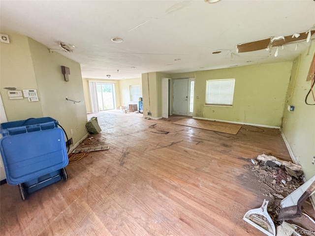 7889 Chilson Rd, Hamburg, MI 48169 - empty room with wood finished floors and baseboards