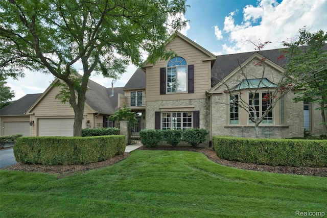 584 Cambridge Way, Bloomfield Hills, MI 48304 - traditional-style house featuring brick siding and an attached garage