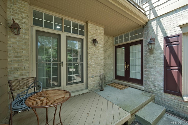 584 Cambridge Way, Bloomfield Hills, MI 48304 - entrance to property with french doors, brick siding, and a porch