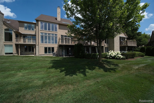 584 Cambridge Way, Bloomfield Hills, MI 48304 - back of property featuring a chimney and a lawn