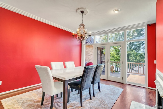 584 Cambridge Way, Bloomfield Hills, MI 48304 - dining space featuring french doors, a chandelier, crown molding, and wood finished floors