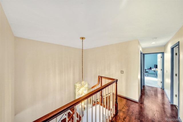 584 Cambridge Way, Bloomfield Hills, MI 48304 - corridor featuring an upstairs landing, dark wood-style floors, and a chandelier