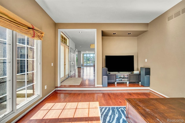 584 Cambridge Way, Bloomfield Hills, MI 48304 - unfurnished living room with wood finished floors and baseboards