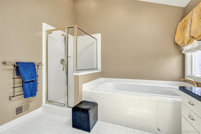 584 Cambridge Way, Bloomfield Hills, MI 48304 - full bath with tile patterned floors, a bath, and a shower stall