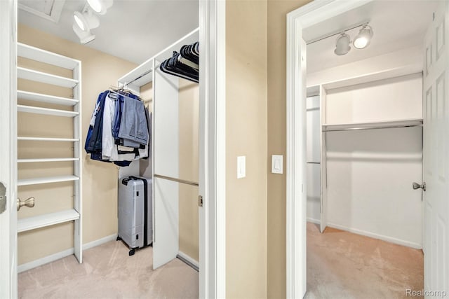 584 Cambridge Way, Bloomfield Hills, MI 48304 - walk in closet featuring light colored carpet