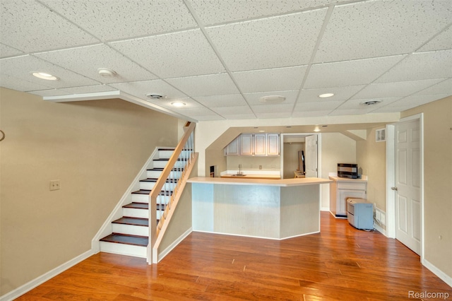 584 Cambridge Way, Bloomfield Hills, MI 48304 - bar area featuring stairway, wood finished floors, a drop ceiling, and recessed lighting