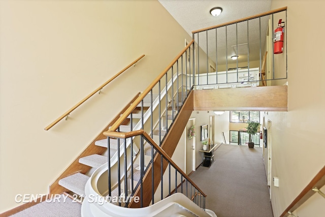 4515 Gratiot Rd, Saginaw, MI 48638 - stairs with carpet flooring and a high ceiling