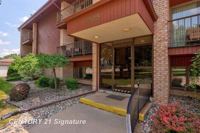 4515 Gratiot Rd, Saginaw, MI 48638 - property entrance with brick siding
