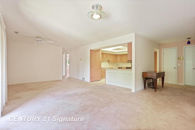 4515 Gratiot Rd, Saginaw, MI 48638 - unfurnished living room with light colored carpet and a ceiling fan