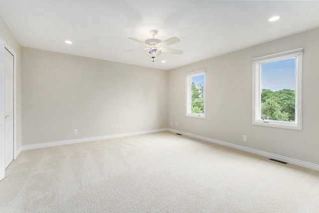 436 Pine Brae St, Ann Arbor, MI 48105 - spare room featuring a ceiling fan, light carpet, and recessed lighting