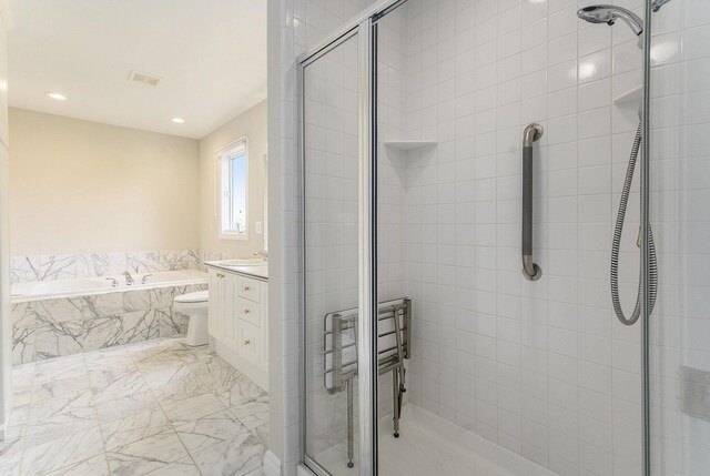 436 Pine Brae St, Ann Arbor, MI 48105 - full bath featuring a stall shower, vanity, a garden tub, recessed lighting, and marble finish floors