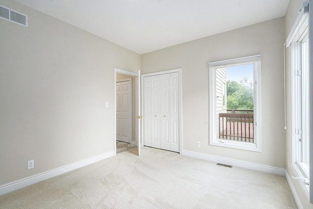 436 Pine Brae St, Ann Arbor, MI 48105 - unfurnished bedroom with light colored carpet and a closet