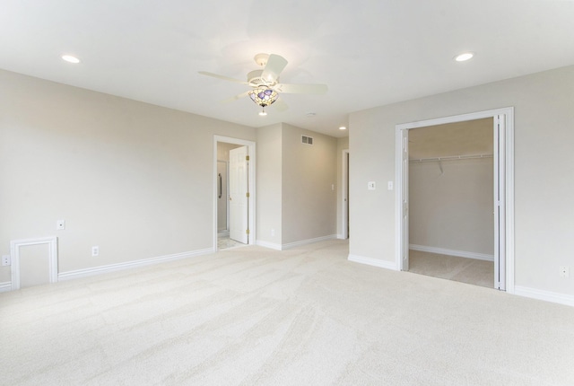 436 Pine Brae St, Ann Arbor, MI 48105 - unfurnished bedroom featuring light carpet, recessed lighting, ceiling fan, and a walk in closet