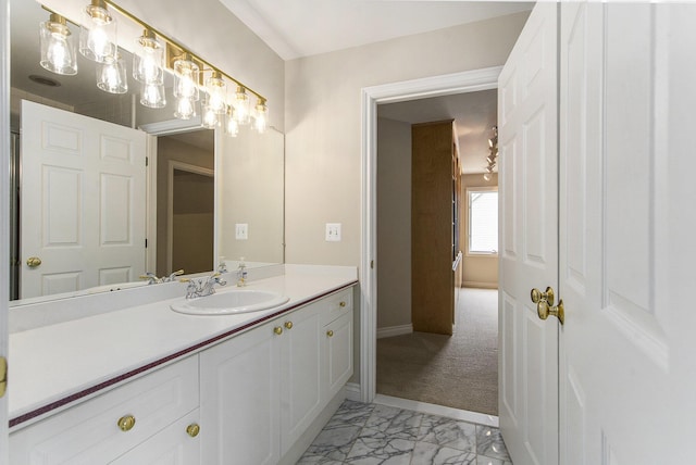 436 Pine Brae St, Ann Arbor, MI 48105 - bathroom featuring vanity and marble finish floors