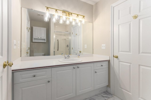 436 Pine Brae St, Ann Arbor, MI 48105 - bathroom with a shower stall, vanity, and marble finish flooring