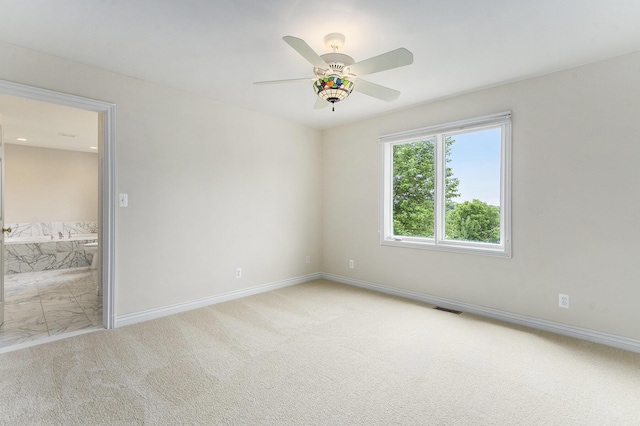 436 Pine Brae St, Ann Arbor, MI 48105 - carpeted empty room with a ceiling fan and baseboards