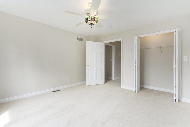 436 Pine Brae St, Ann Arbor, MI 48105 - unfurnished bedroom with light carpet, a closet, and a ceiling fan