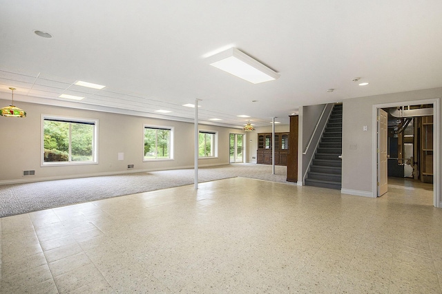 436 Pine Brae St, Ann Arbor, MI 48105 - unfurnished living room featuring stairs and recessed lighting