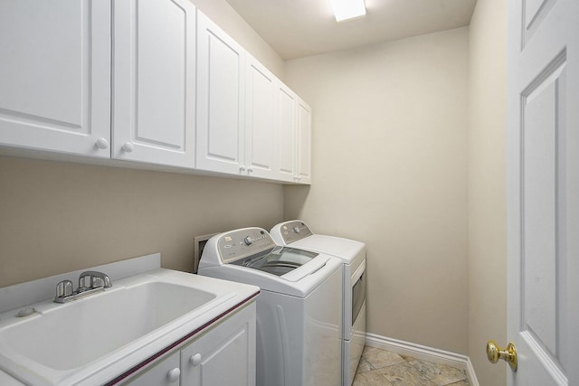 436 Pine Brae St, Ann Arbor, MI 48105 - washroom featuring cabinet space and washing machine and clothes dryer