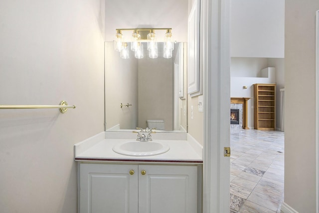 436 Pine Brae St, Ann Arbor, MI 48105 - bathroom featuring vanity and a fireplace