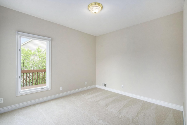 436 Pine Brae St, Ann Arbor, MI 48105 - unfurnished room featuring light colored carpet and baseboards