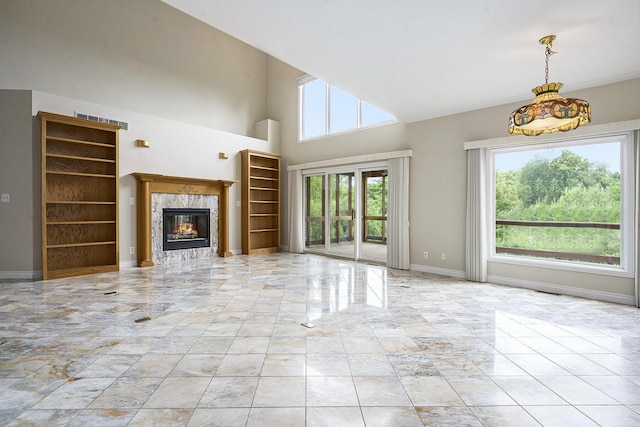 436 Pine Brae St, Ann Arbor, MI 48105 - unfurnished living room featuring marble finish flooring and a high end fireplace