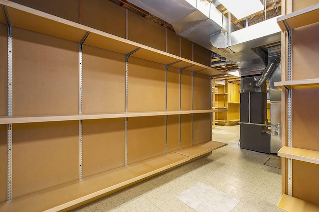 436 Pine Brae St, Ann Arbor, MI 48105 - basement featuring tile patterned floors and heating unit