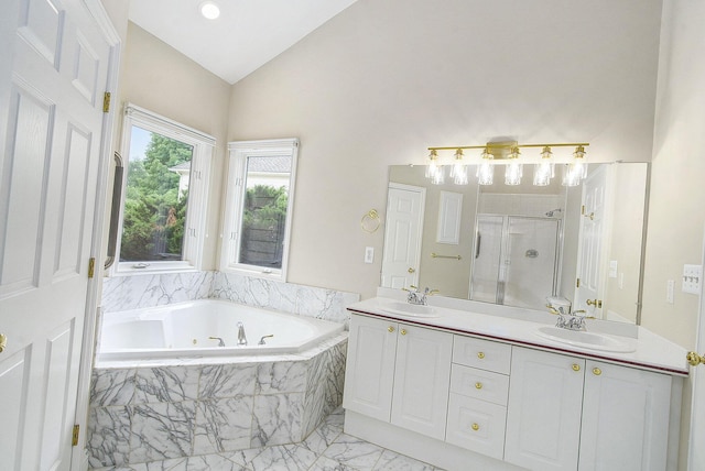 436 Pine Brae St, Ann Arbor, MI 48105 - full bathroom featuring vaulted ceiling, a jetted tub, a stall shower, double vanity, and marble look tile flooring