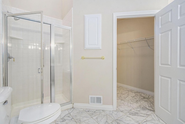 436 Pine Brae St, Ann Arbor, MI 48105 - bathroom with marble finish flooring, a stall shower, and a spacious closet