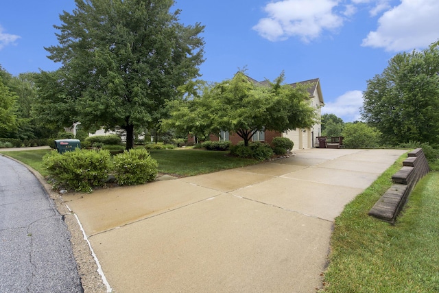 436 Pine Brae St, Ann Arbor, MI 48105 - view of front of house featuring driveway and a front yard