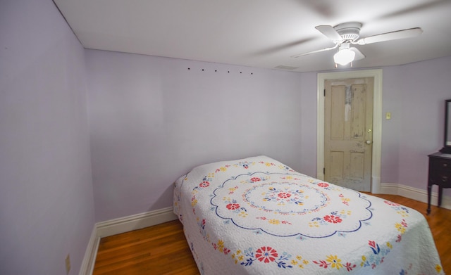 500 W Chicago St, Coldwater, MI 49036 - bedroom featuring wood finished floors and ceiling fan