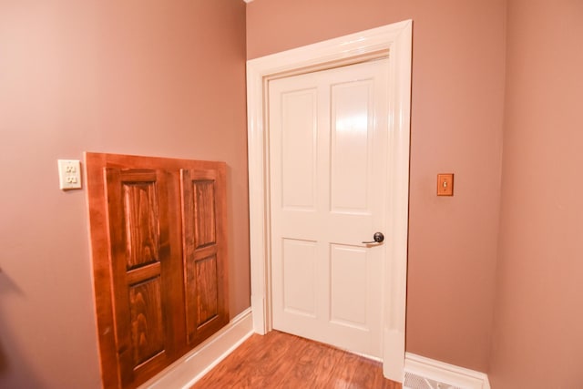 500 W Chicago St, Coldwater, MI 49036 - hallway featuring wood finished floors and baseboards