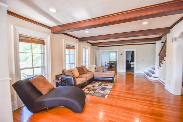 500 W Chicago St, Coldwater, MI 49036 - living room with light wood-type flooring, stairs, beam ceiling, crown molding, and recessed lighting
