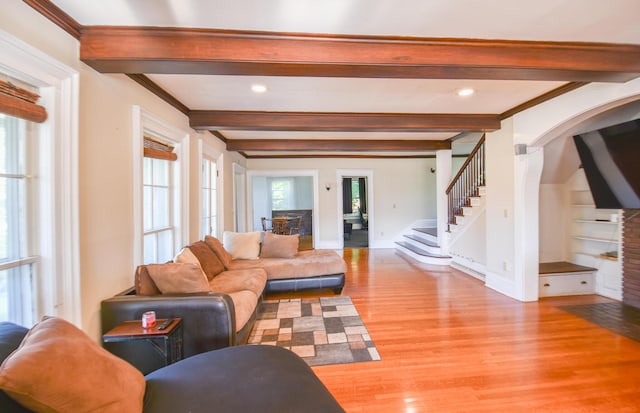500 W Chicago St, Coldwater, MI 49036 - living room with beam ceiling, wood finished floors, stairs, crown molding, and recessed lighting